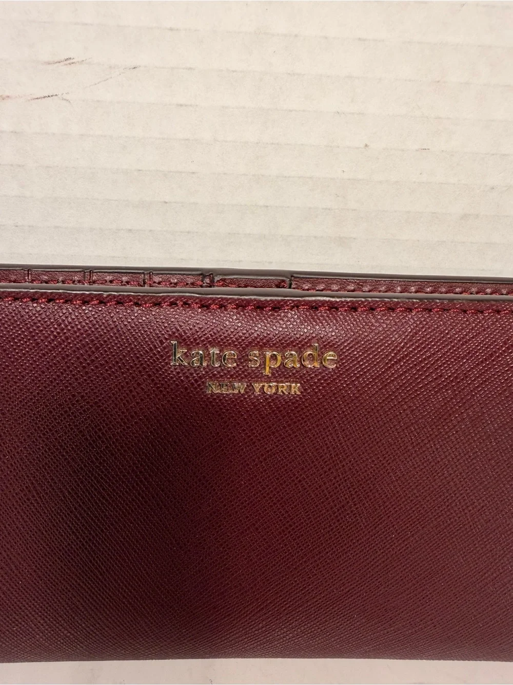 Kate Spade Cameron Large Slim Bifold Wallet in Burgundy Saffiano Leather
